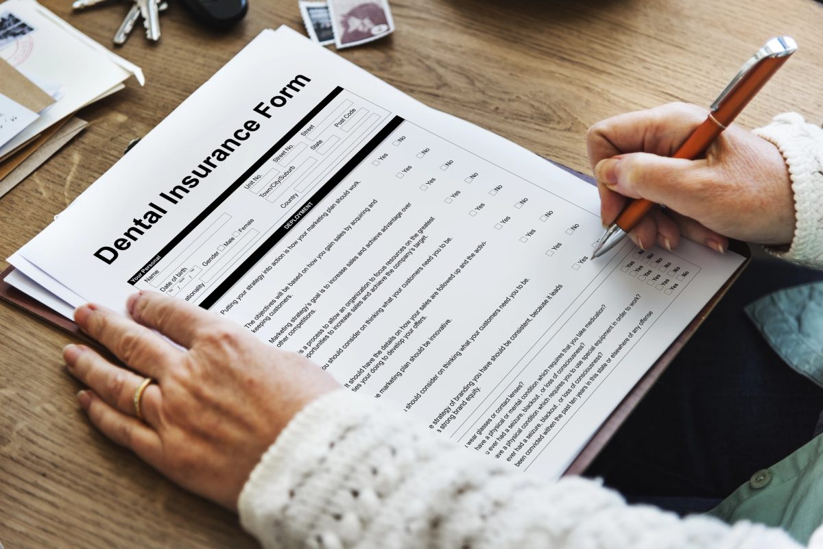 Patient reviewing dental insurance information